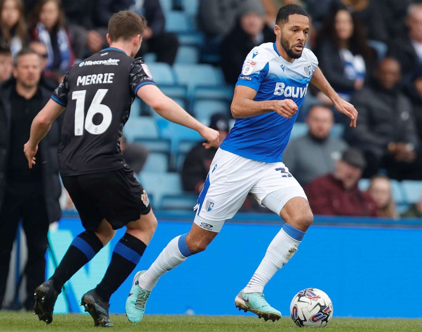 Gillingham's Tim Dieng up against Tranmere player Chris Merrie in midfield – the Frenchman was controversially denied a stoppage-time winning goal on Saturday. Picture: Julian_KPI