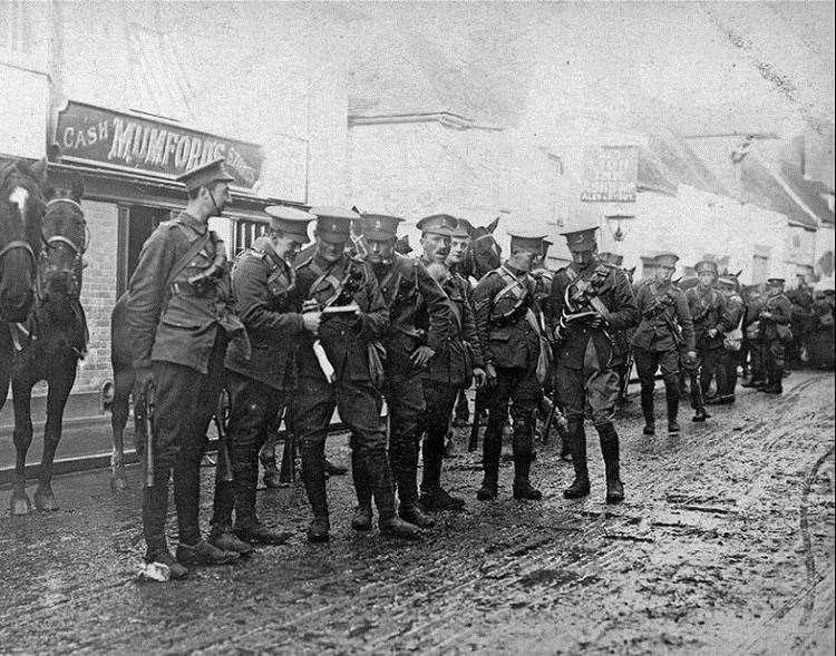 Outside the Red Lion in 1914, a dismounted troop of the Queen's Own West Kent Yeomanry. Picture: Rory Kehoe