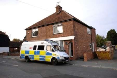 A police van outside the semi-detached house in Sturry - the property is on the right. Picture: Terry Scott