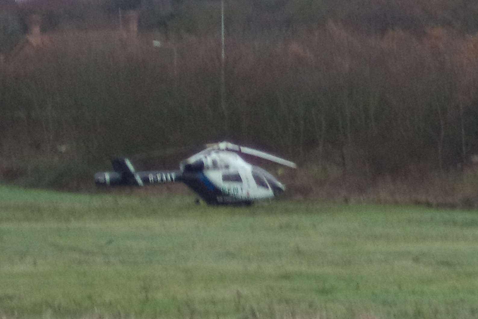 An air ambulance has landed in a field next to the Thanet Way