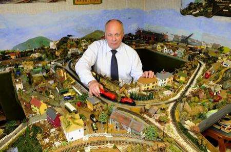 Model railway owned by Fred Lucas who died recently and will have to be dismantled and taken out of the loft of his house. Peter Scobey with the train set, who is his executor.