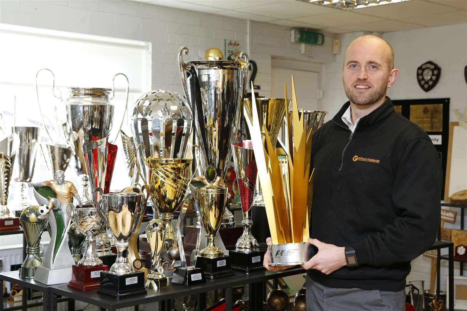Jon Ford from Aford Awards with some of the awards his company produces