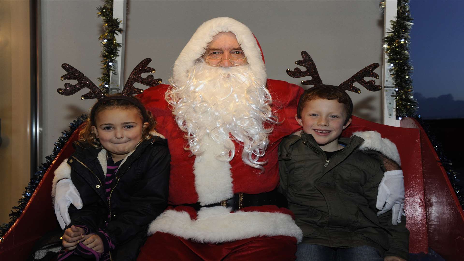 KM Walk to School Challenge winners, Amelia Petzendorfer, seven, and James Cunningham, six, from St Mildred’s Infant School met Santa and helped to switch on the festive lights at Westwood Cross.