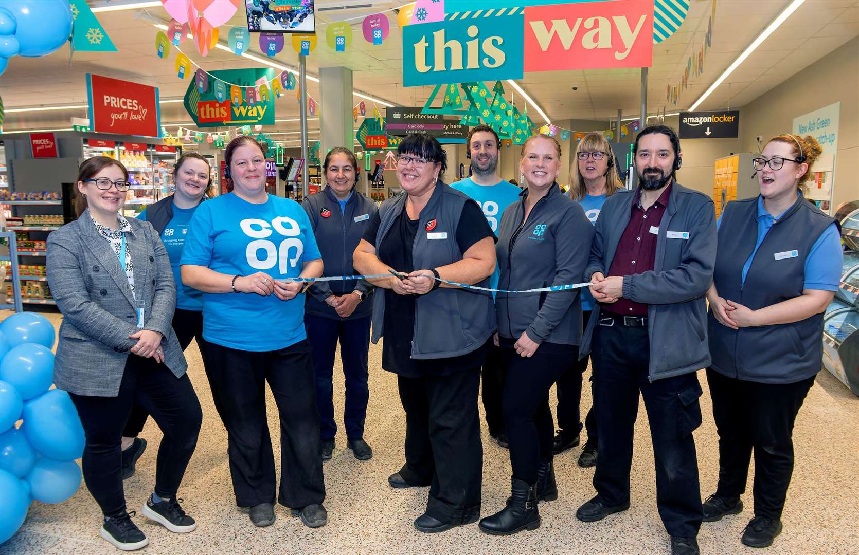 Members of the team unveil the new revamp of the store. Picture: Co-op