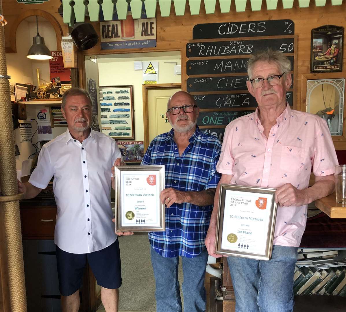 The trio celebrate being named Medway's best pub and also taking top spot for west Kent in June
