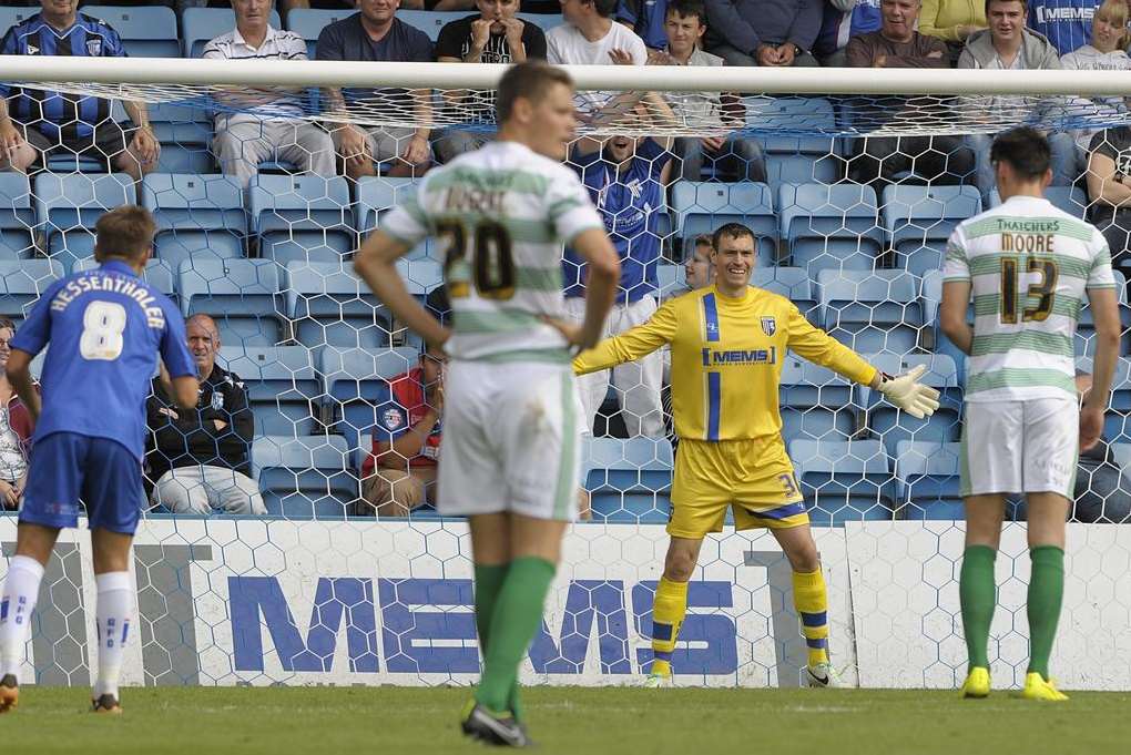 Stephen Bywater prepares to save the Yeovil penalty taken by Kieffer Moore. Picture: Barry Goodwin