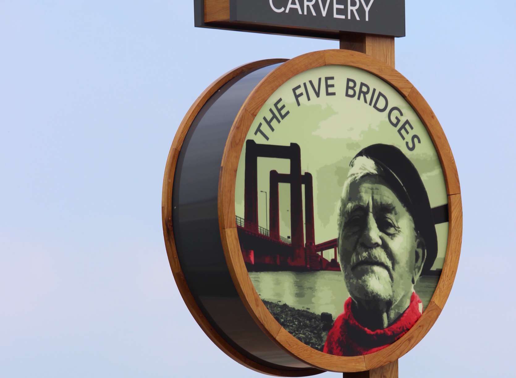 The Five Bridges pub sign that features John Cross's grandfather, Dick Evenden