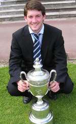 Liam Burns with the Kent Amateur Golf Championship trophy