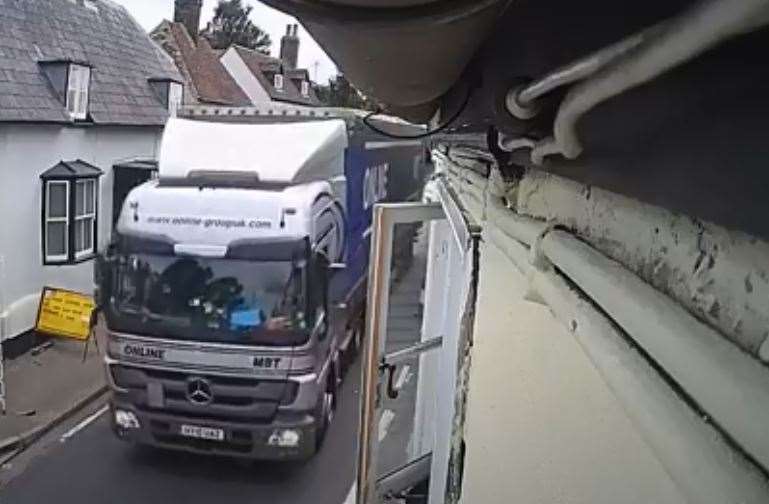 CCTV captures a lorry moments before it hits the house