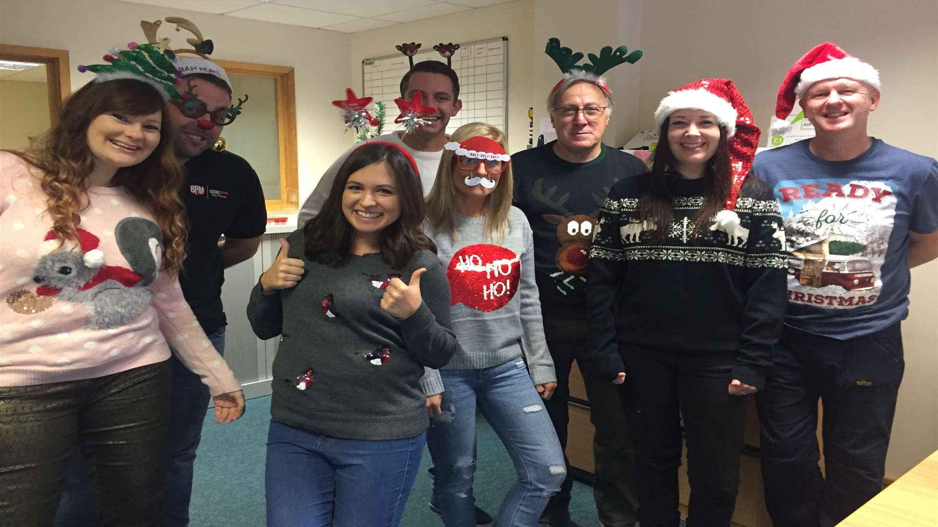 Staff at Easy-Print UK showing off their finest knitwear