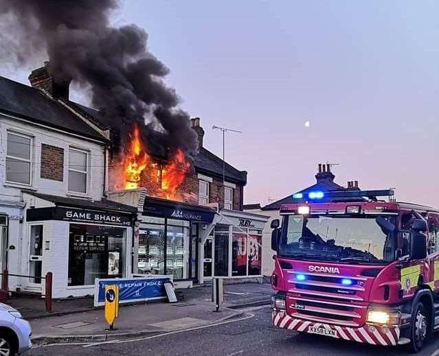 The blaze above the shop. Picture: Ian Hankinson
