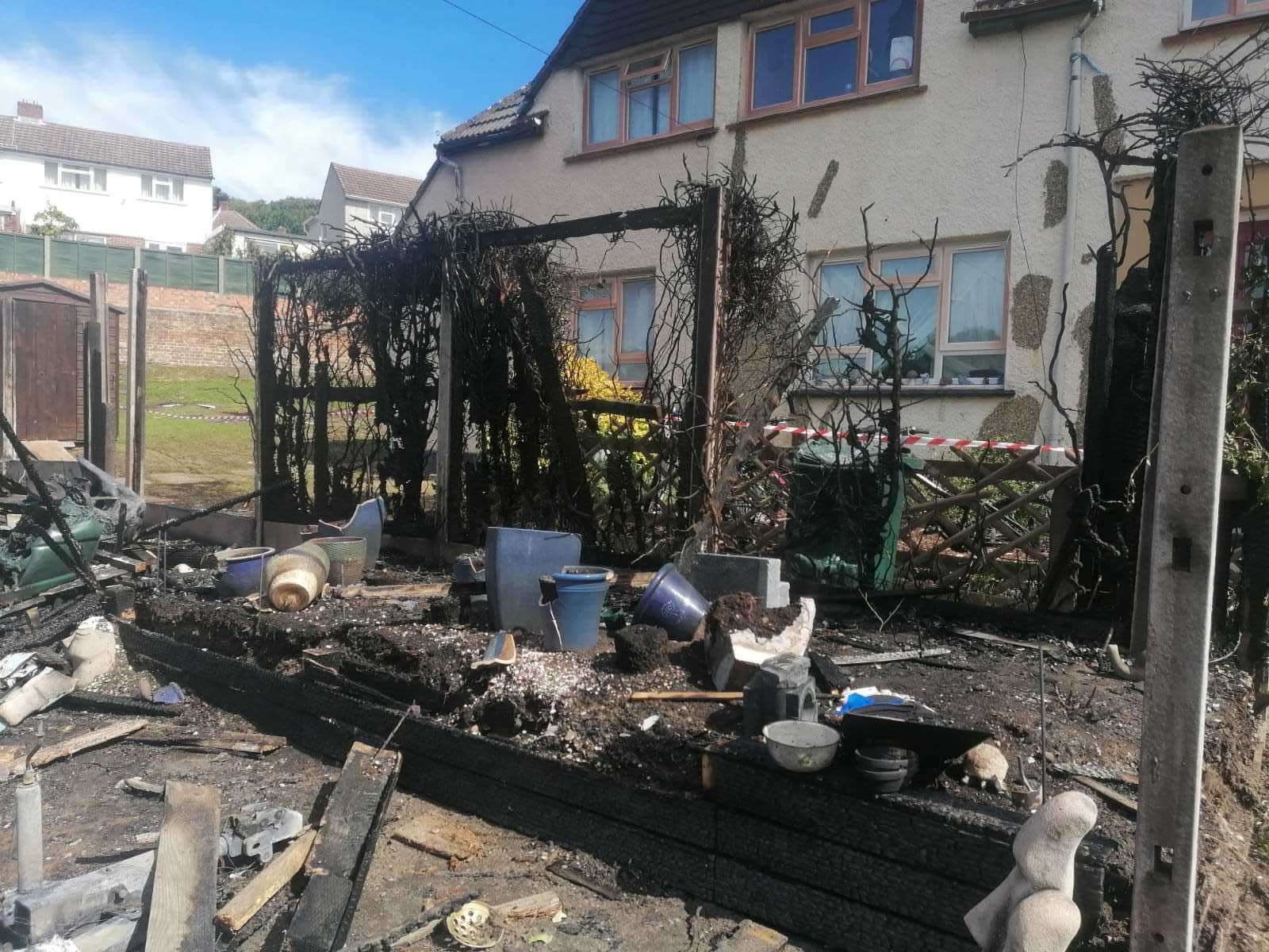 Neighbouring garden fences and panels were destroyed in the fire