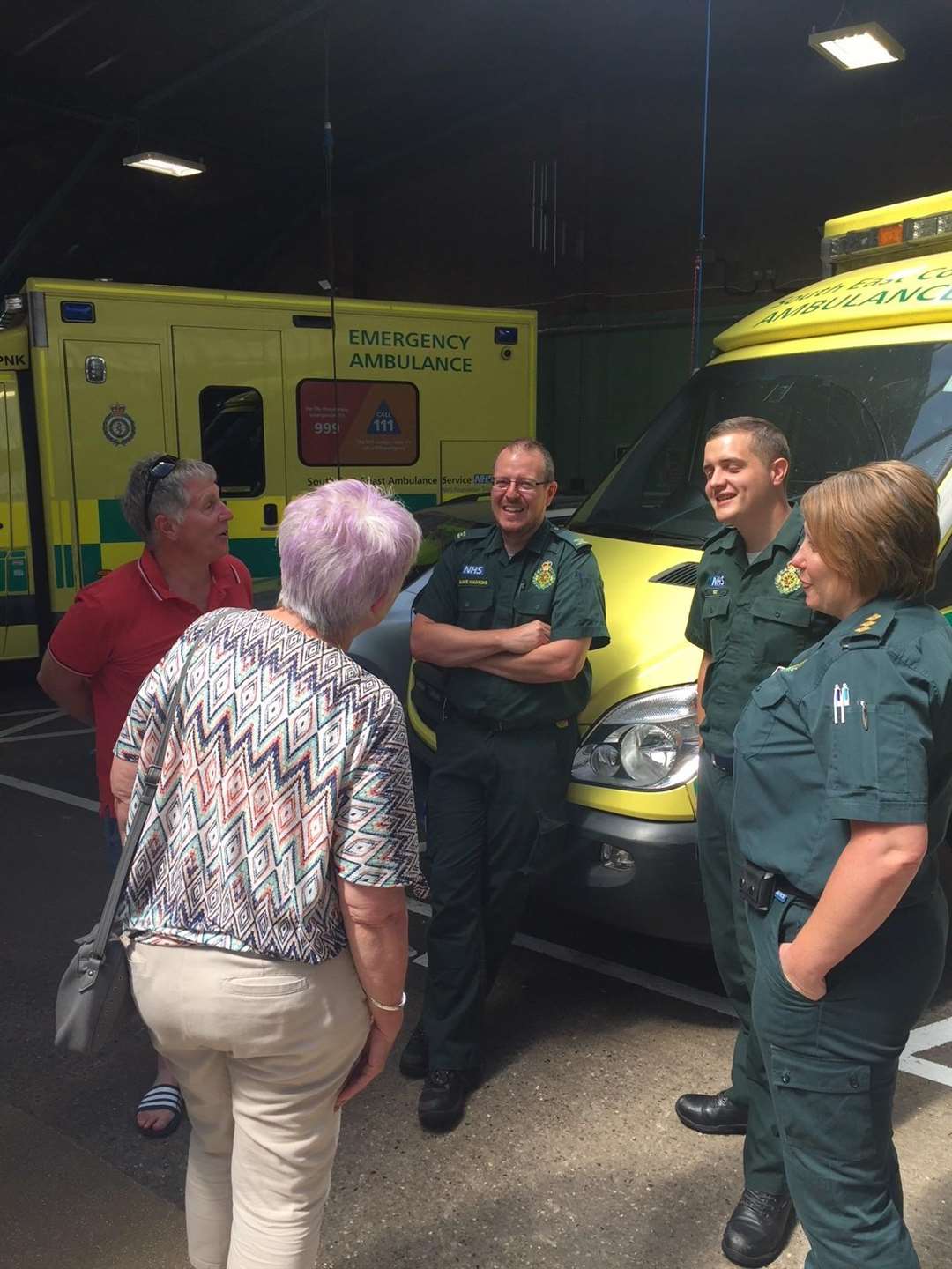 Sue and Malcom chatting with the paramedics (3084527)