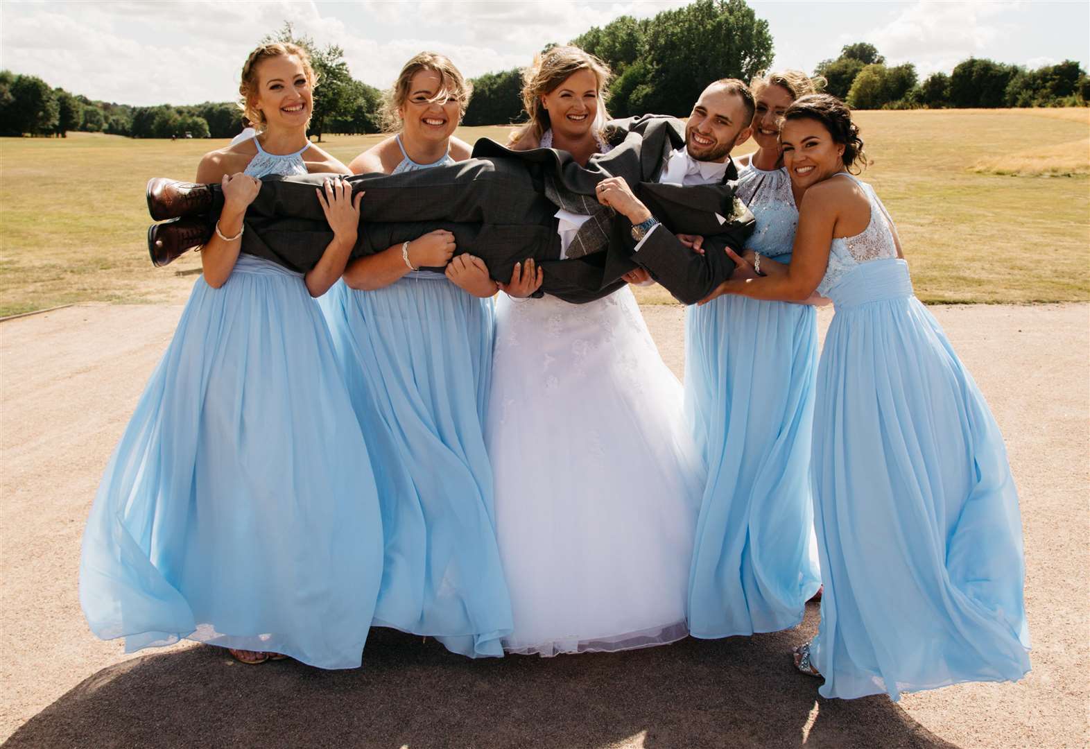 The bridesmaids always knew Stan was head over heels for Holly