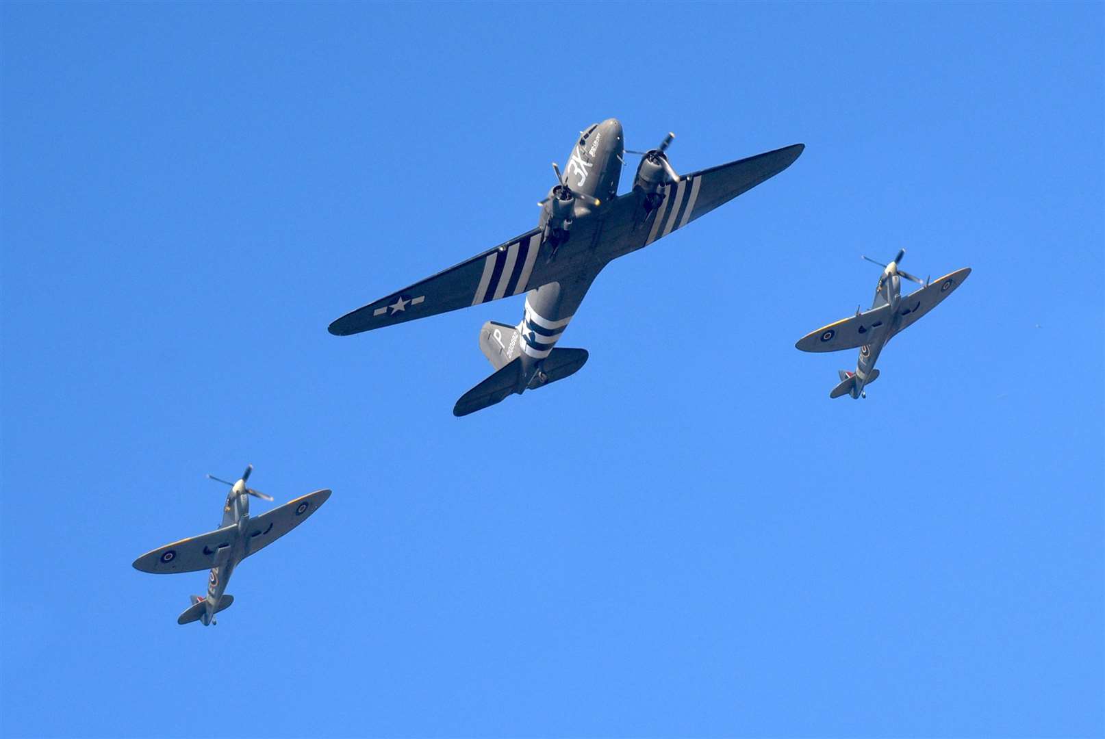 Aero Legend Spitfires and a C. 47 Dakota flew over Gravesend as part of the Remembrance Day commemorations. Photo: Fraser Gray. (21360650)