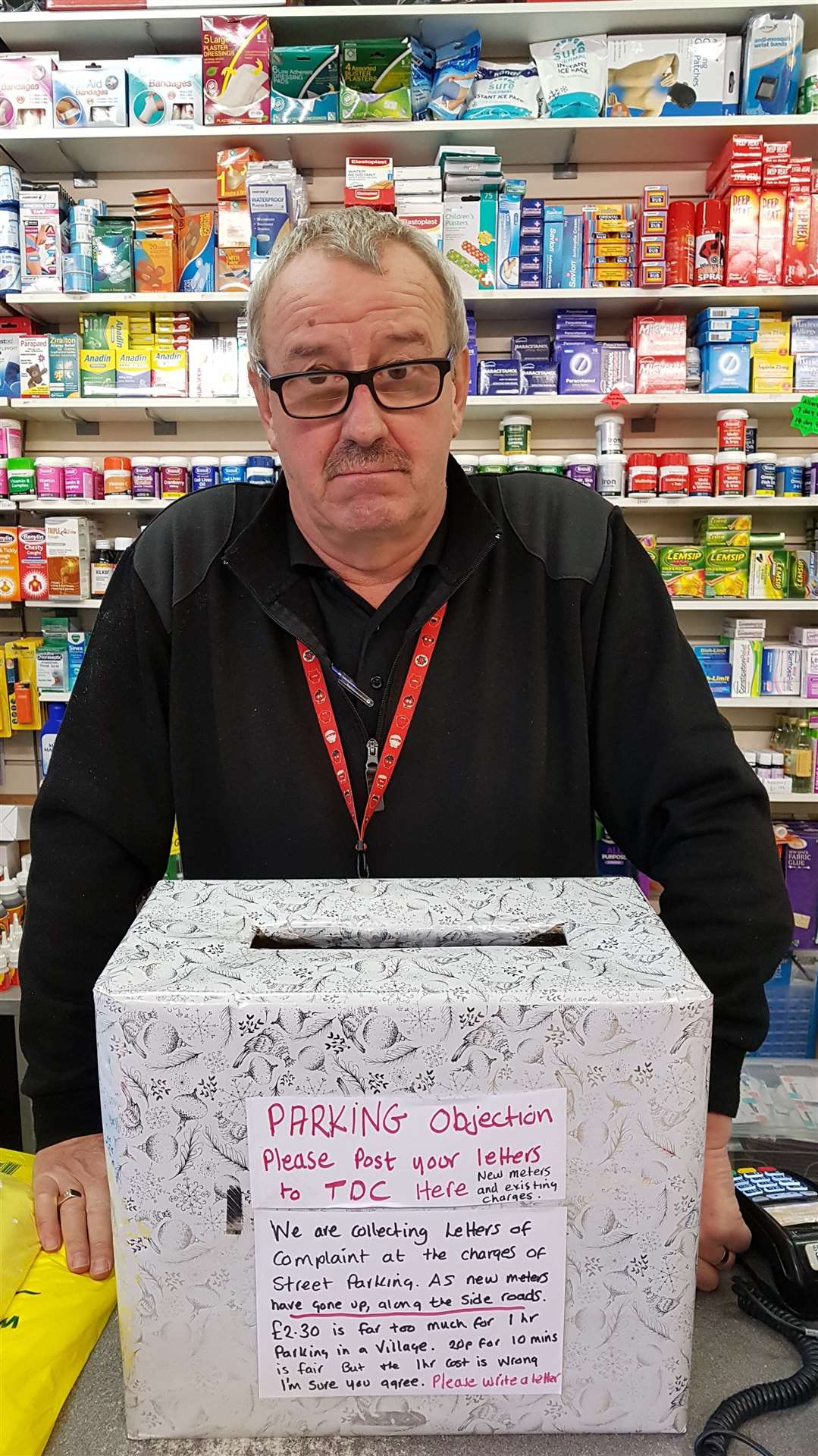 Nick Adams from Priceless Discount with the box of letters