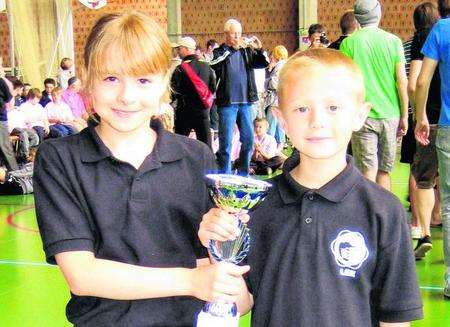Dover Lifeguards duo Hannah Wain and Lee Shepherd with the trophy won at the Calais Festival of Sport