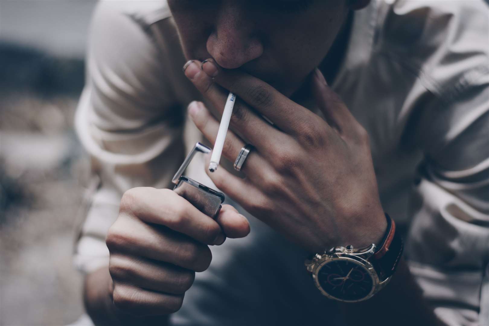 Man smoking a cigarette. Stock image