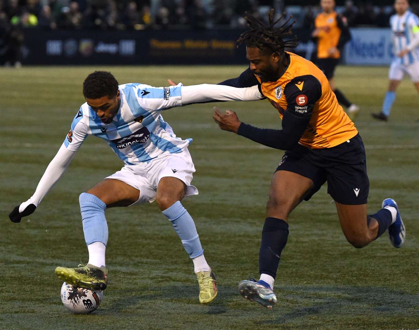 Maidstone United substitute Liam Sole holds off his man at Slough. Picture: Steve Terrell