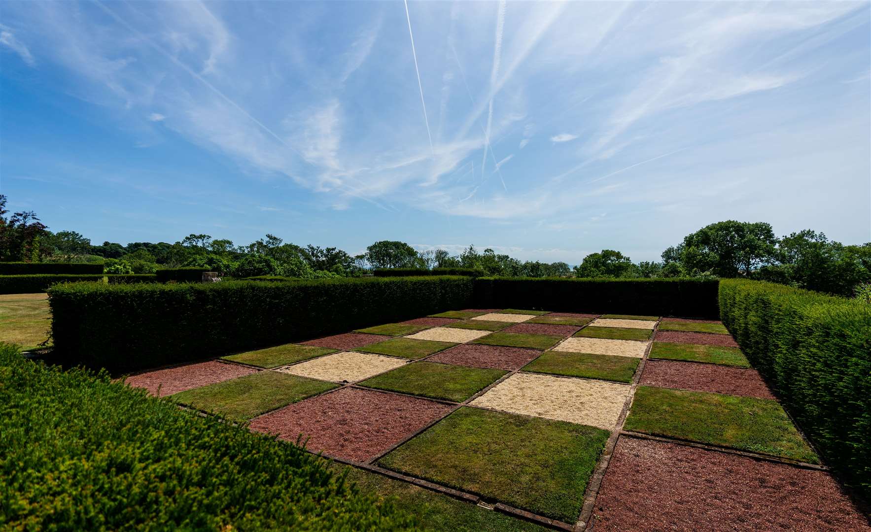 The tour includes the eye-catching checkerboard garden. Picture: Aspinall Foundation