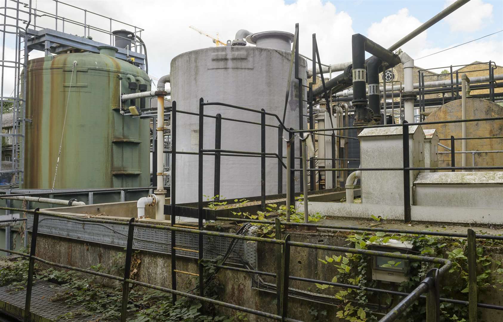 Chemical storage tanks adjacent to the Pulp Prep building