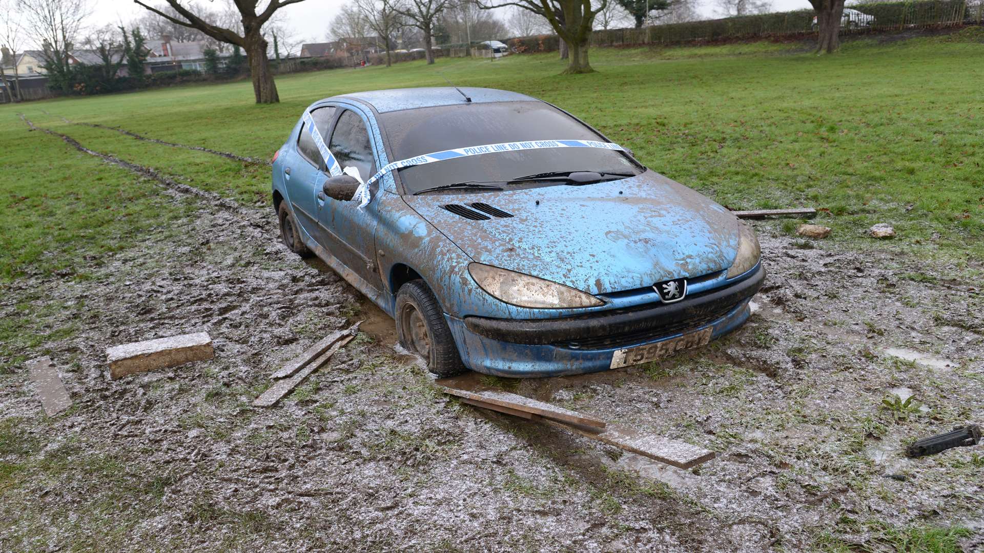 This car was abandoned in the middle of Kennington Recreation ground after getting stuck in the mud