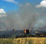 Flames engulf a field at Ham Farm in Faversham. Picture: Poppy Johnson