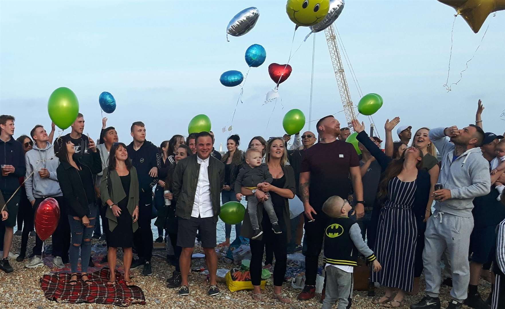 Celebrating his life. The balloons are released in Steven's honour.