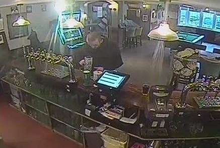 CCTV footage from a local pub shows Parker buying drinks with stolen money. Picture: Kent Police