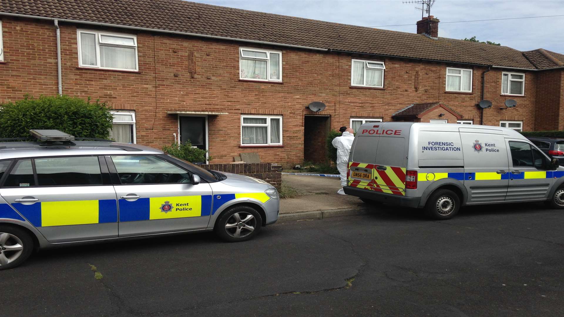 A police forensic team at the scene of the stabbing