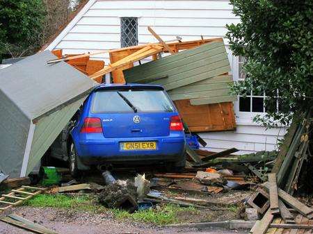 A car crashed into a shed and house in Underdown Lane, Herne Bay.