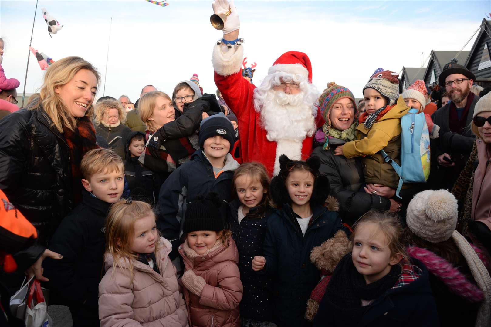 Father Christmas is greeted by the crowds during the WhitSparkle Christmas Celebration in the harbour last year