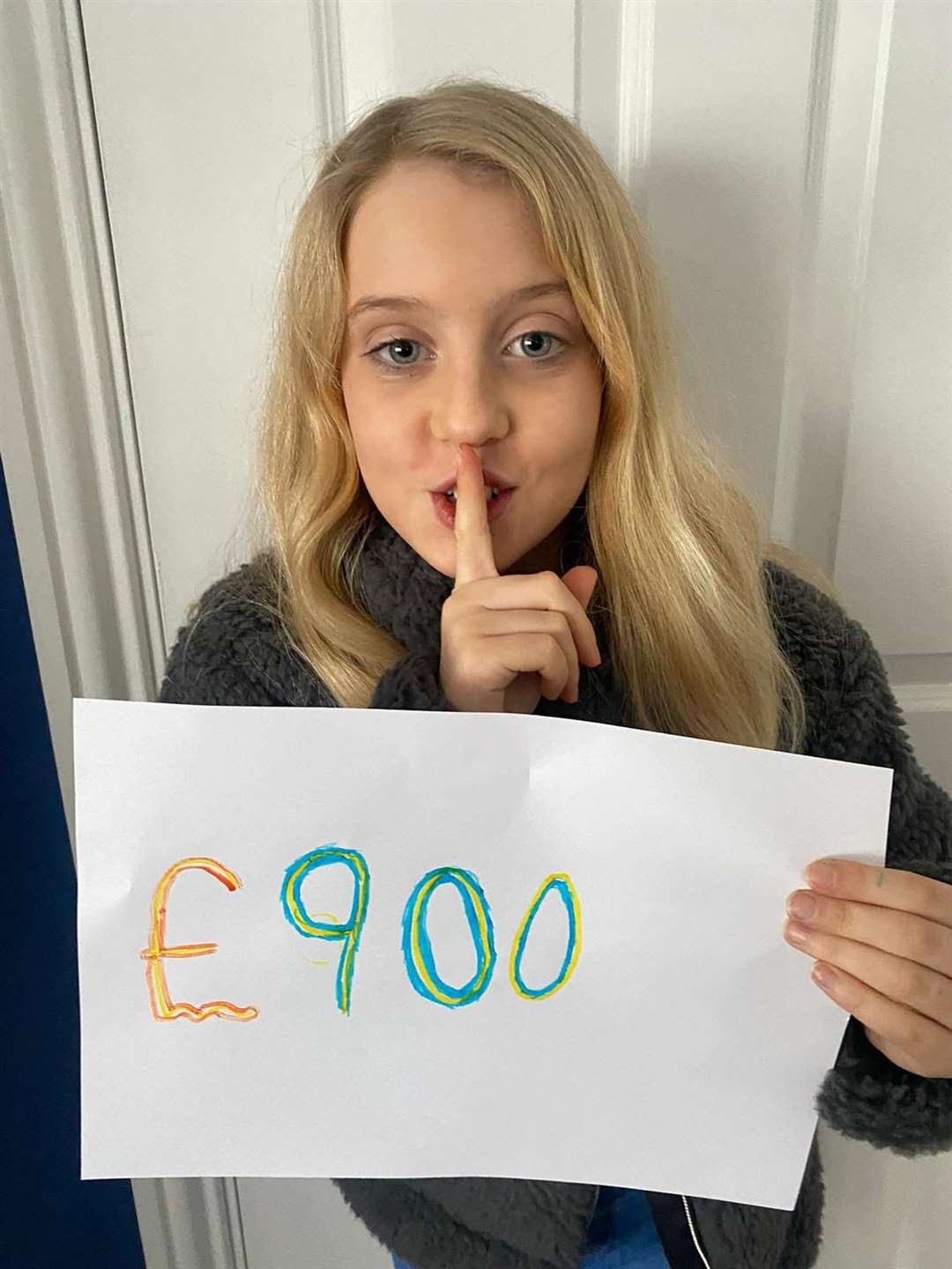 Bella, 10, has raised more than £900 with her sponspored silence (44001387)