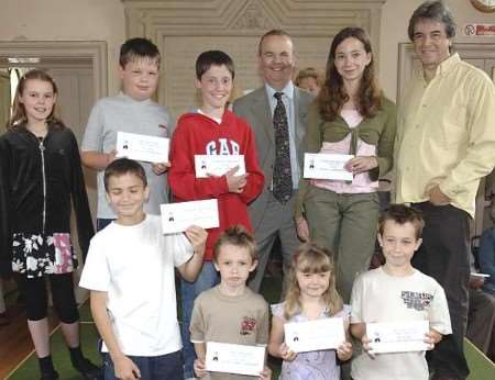 Ian Hislop, centre, with the competition winners and runners-up. Picture: MATTHEW WALKER