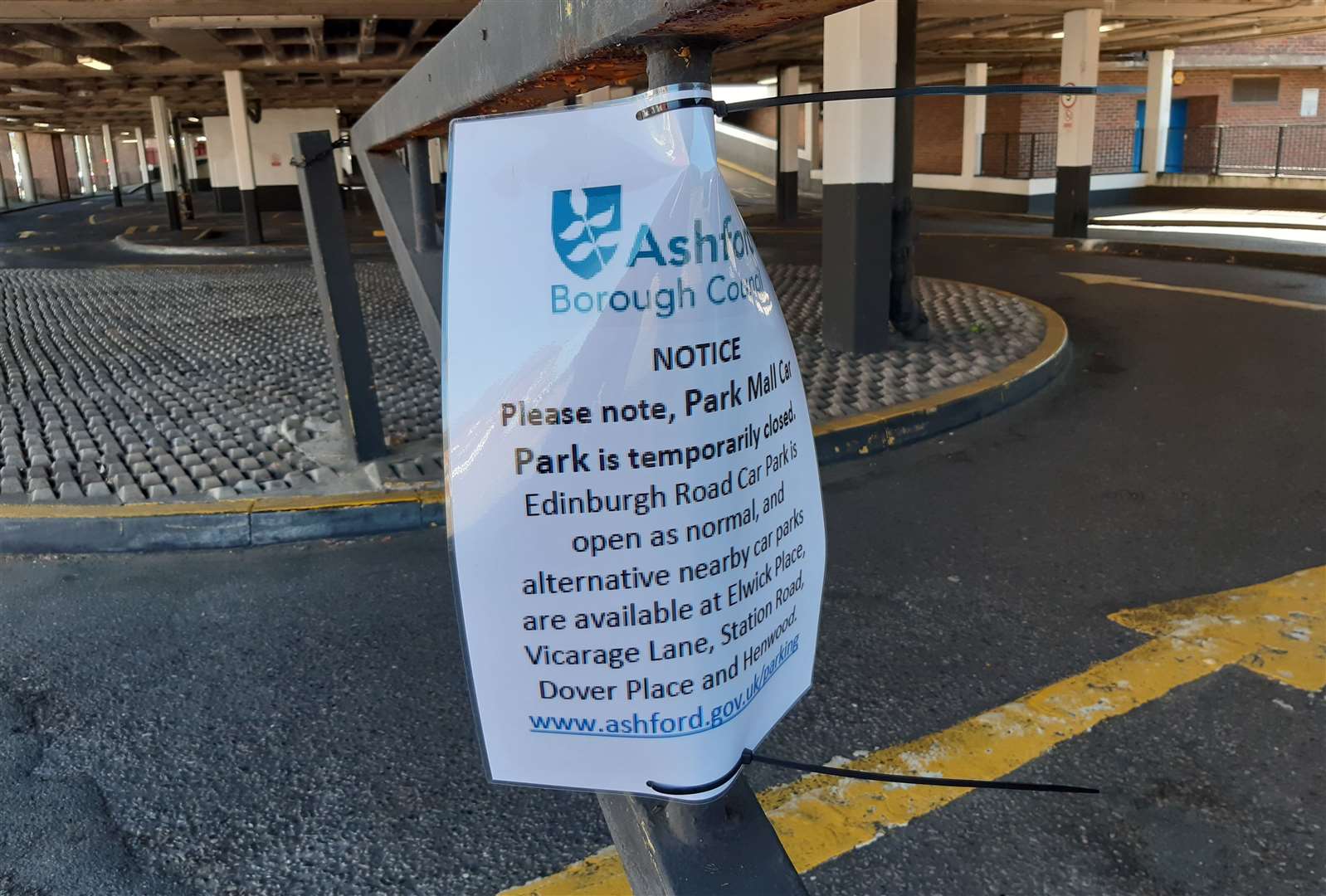 An ABC sign at the car park entrance describes the closure as "temporary"