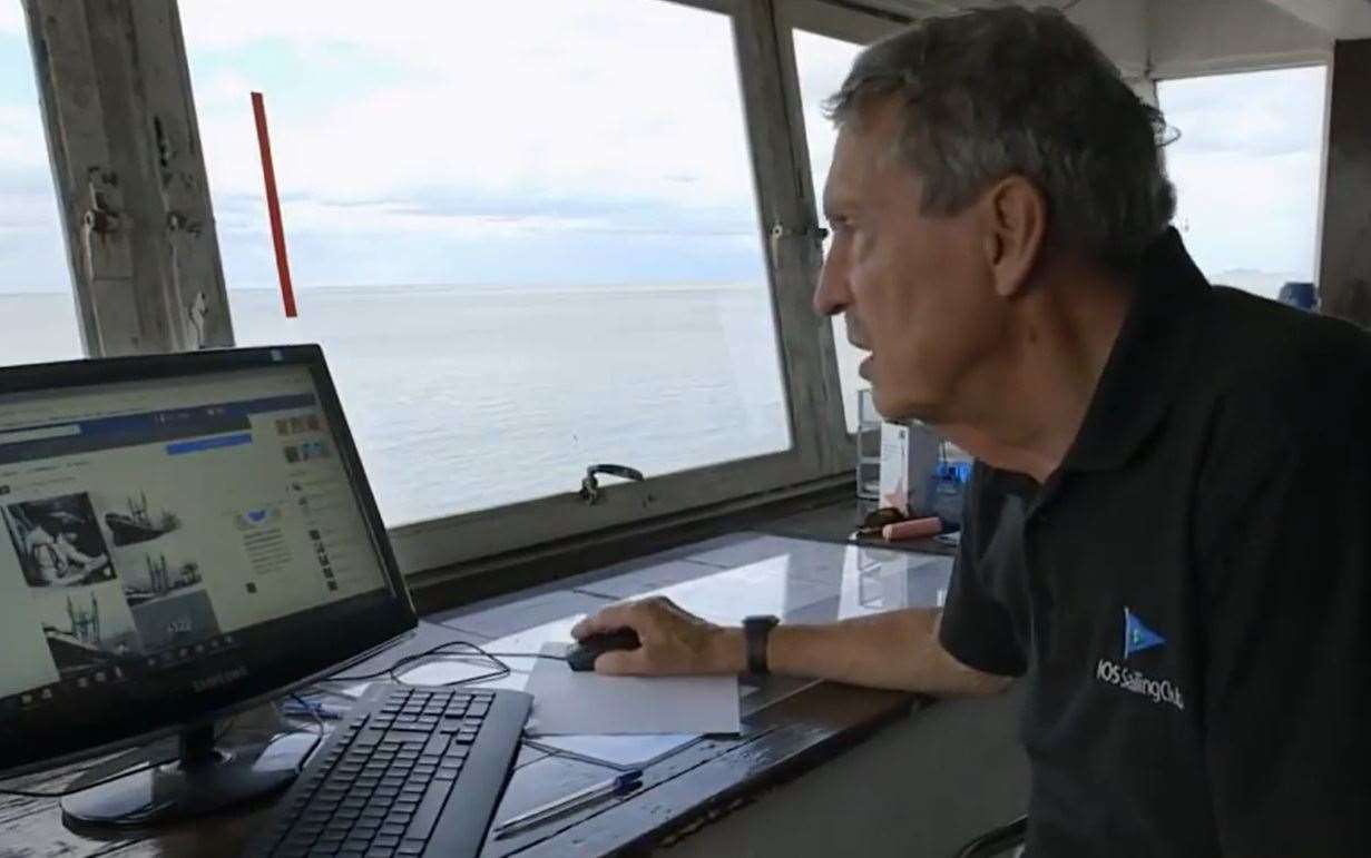 Tim Bell in the control tower of the Isle of Sheppey Sailing Club checking the masts. Picture: NDR