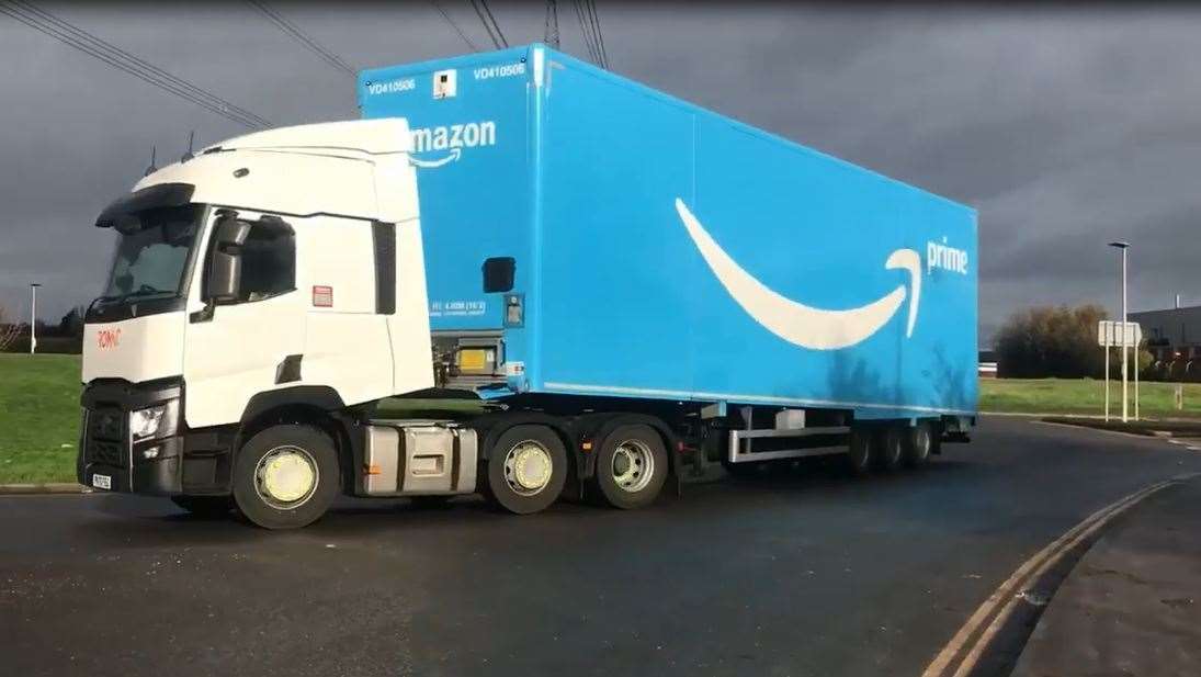 An Amazon lorry leaves the Hoo depot