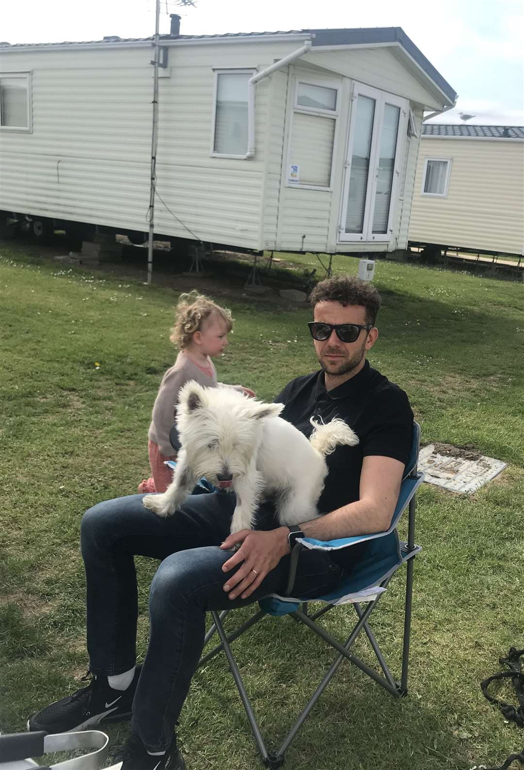 Nicola's son Jack Gearey with pet dog Tom