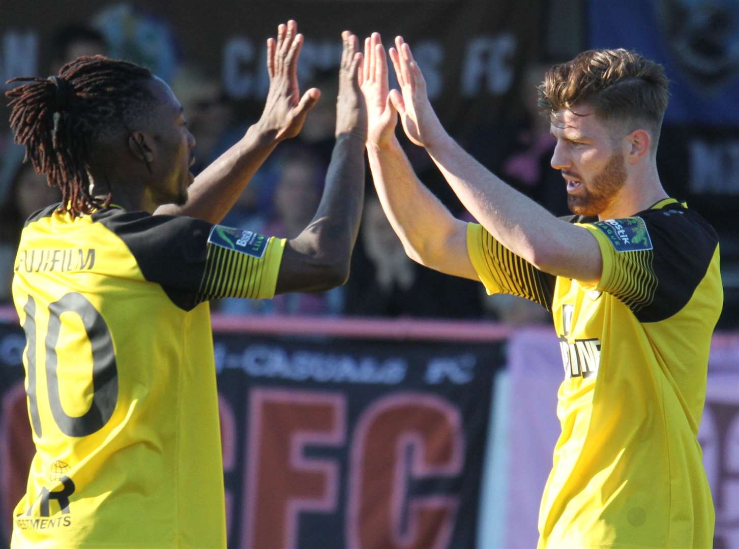 Margate's Noel Leighton, right, celebrates a goal with Kadell Daniel Picture: Don Walker