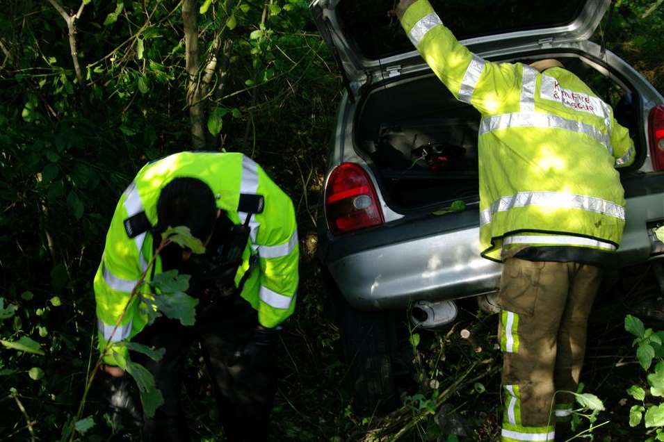 Emergency workers at the scene of a crash in Chattenden. Picture: Stanley Arrowsmith