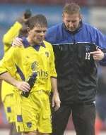 DEJECTED: Andy Hessenthaler is consoled by Iwan Roberts after the latest defeat. Picture: GRANT FALVEY