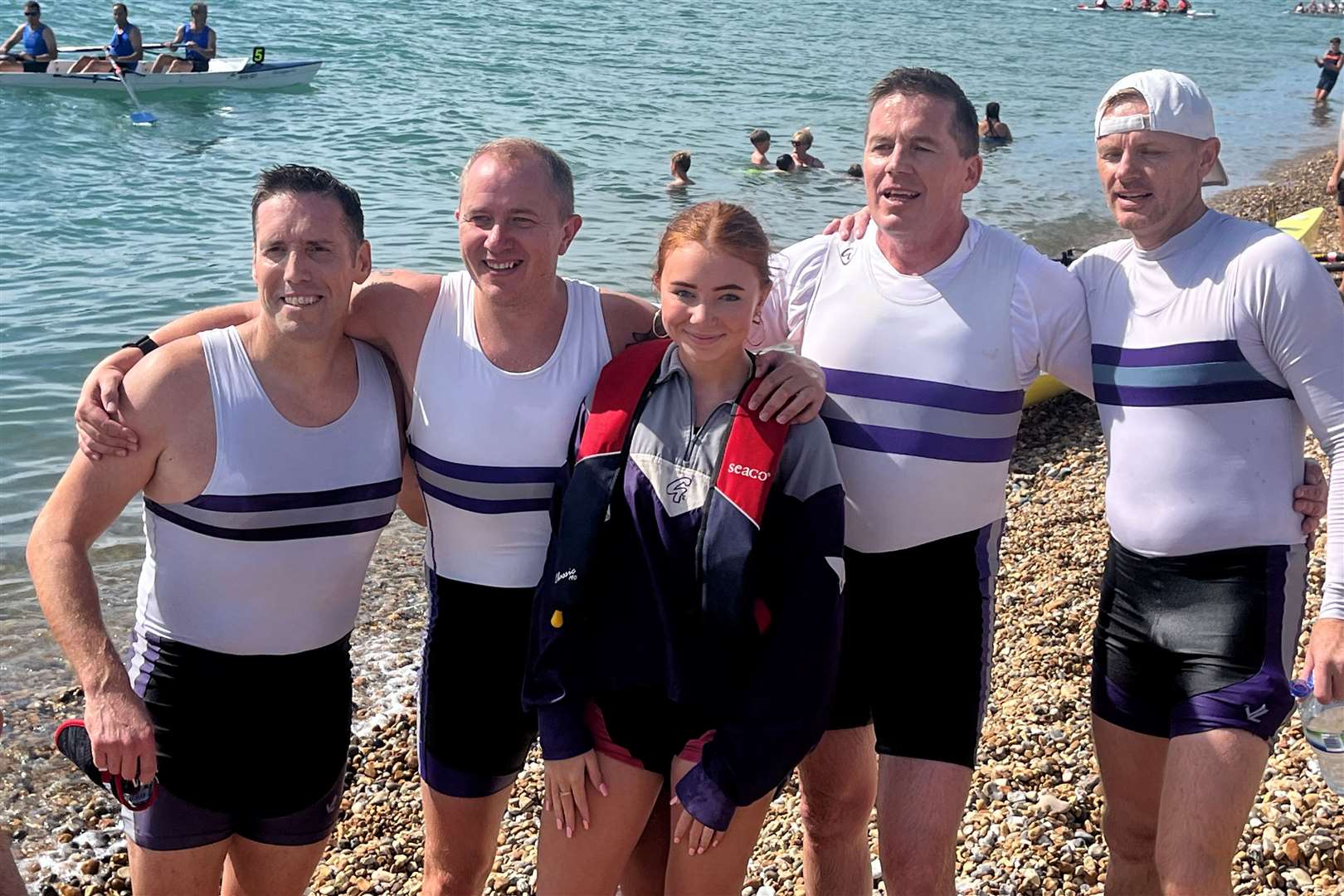 The men's masters 40-plus open category title winners from Deal Rowing Club. From left, Kirk Bell, James Morgan, cox Scarlett Morgan, Justin Dodrill and Jason Morgan