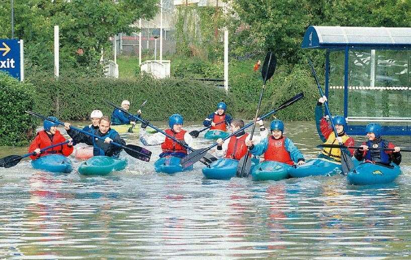 People took to canoes on the Sainsbury's flooded car park in Canterbury in 2000