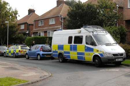 Police vehicles in Old Park Avenue, Canterbury, where the cannabis plants were found