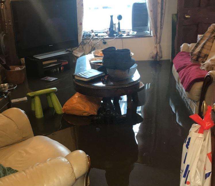 Flooding in the living room. Picture: Megan Deegan