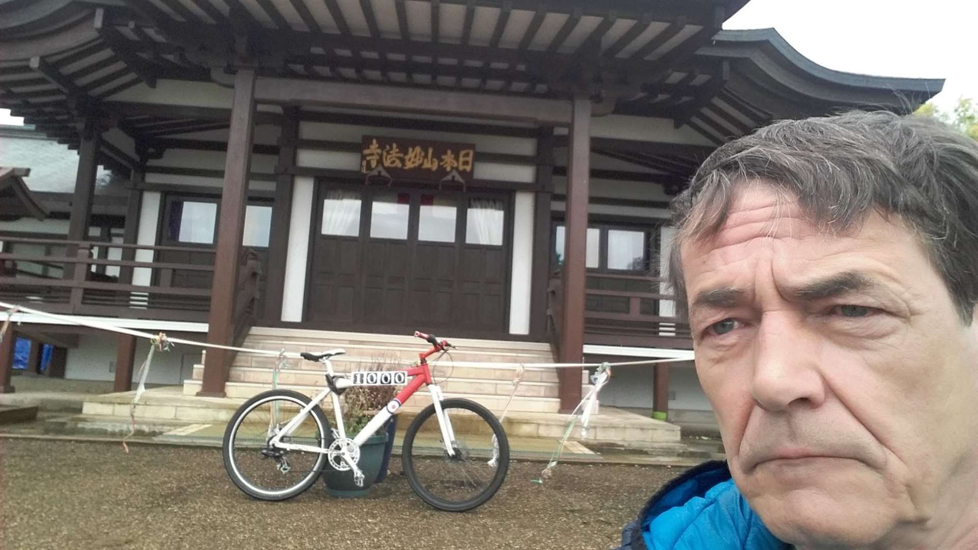 He stopped at a Buddhist temple Milton Keynes with his bike named 'Braders', after Sir Bradley Wiggins