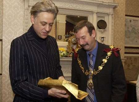 Sir Bob Geldof receives Jacobs History of Faversham from Mayor Cllr Mick Gates. Picture: CHRIS DAVEY