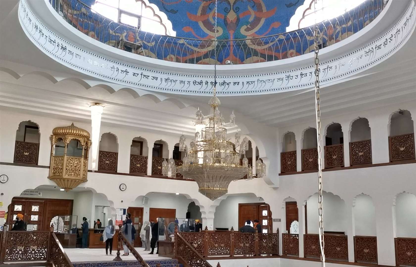 Many people who visit the gurdwara have families out in India (46832971)