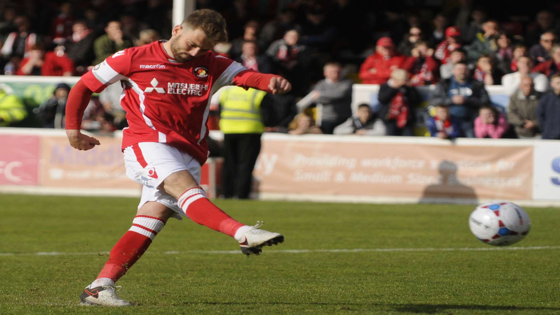 Matt Godden scores during the penalty shoot-out against Maidstone Picture: Gary Browne