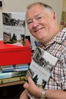 John Clancey, of Woodside Gardens, Sittingbourne, with copies of his newly-published book, Swale Villages through time